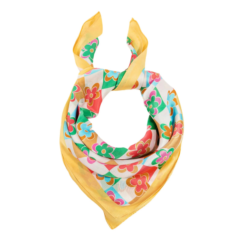 Colorful floral-patterned silk scarf with yellow border, perfect for stylish accessories