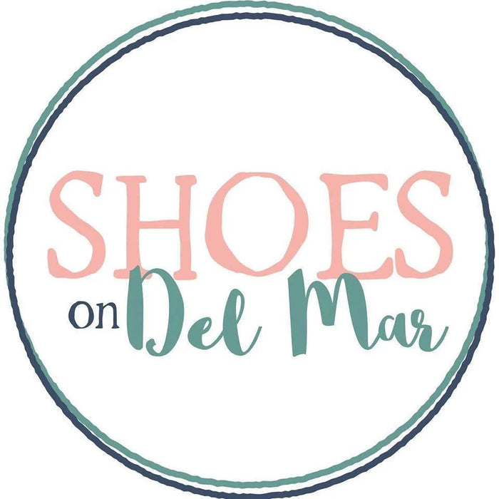 Circular logo of SHOES on Del Mar in pink and teal for Free Unlimited Returns