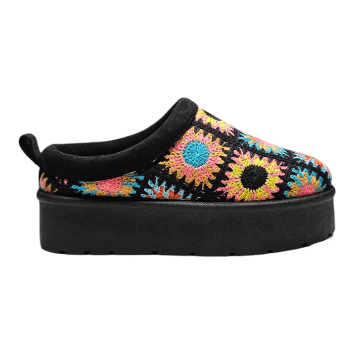 Colorful floral-patterned platform crochet clog with a black sole and trim