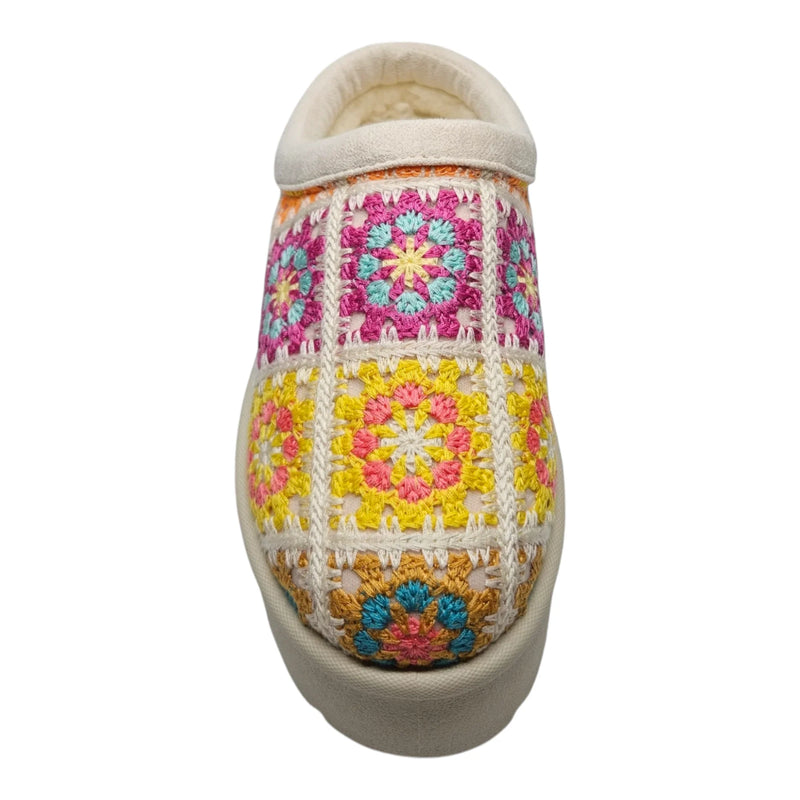 Colorful crocheted slipper with floral granny square for the Frosty Platform Crochet Clog