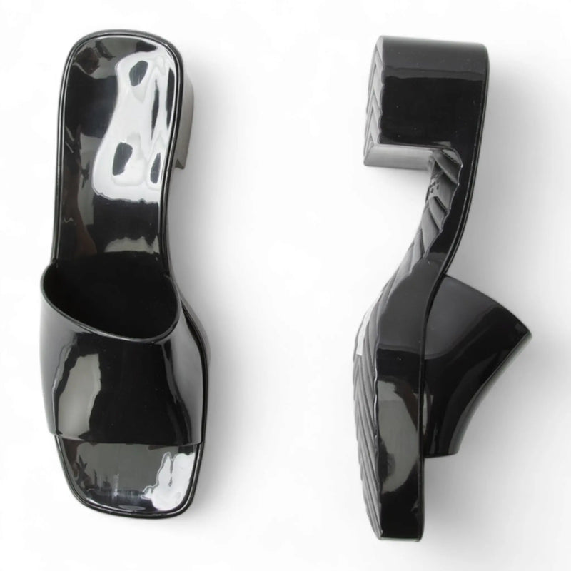 Glossy black high-heeled mules with square toes from Platform Jelly Slides collection