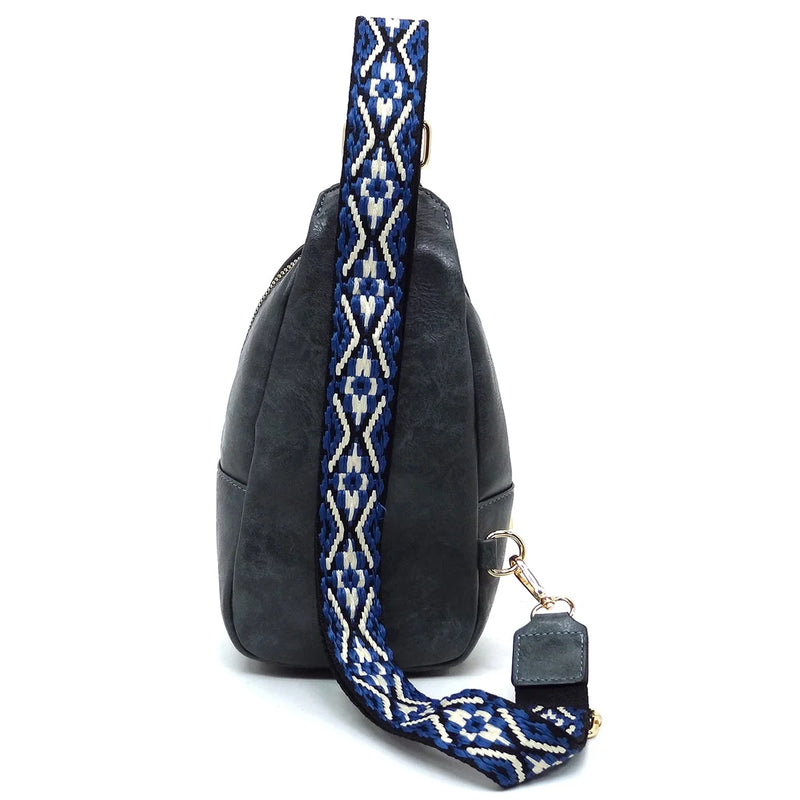 Black leather handbag with decorative blue and white strap for Guitar Strap Sling Bag