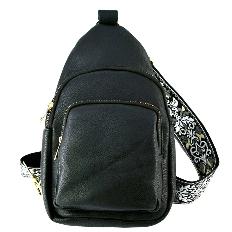 Black leather Guitar Strap Sling Bag featuring a decorative patterned strap