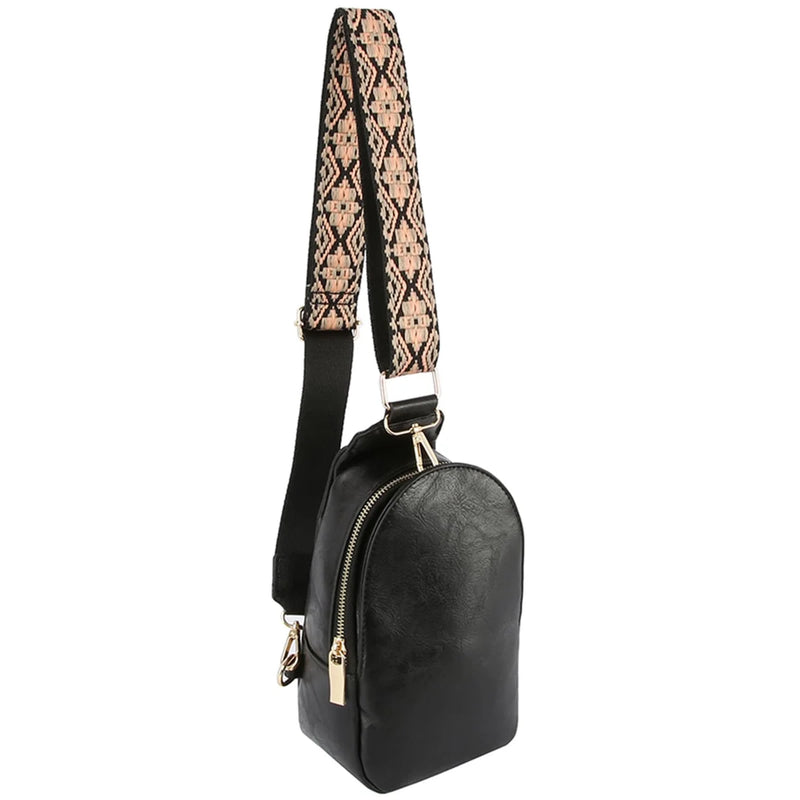 Black leather mini backpack with a patterned shoulder strap for guitar strap sling