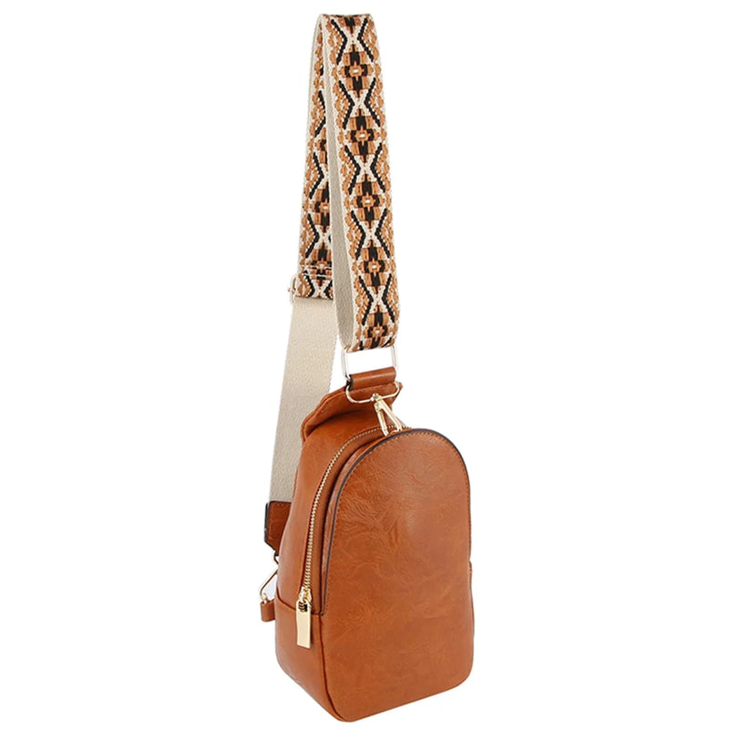 Tan leather Guitar Strap Sling Bag with a patterned fabric strap for added style