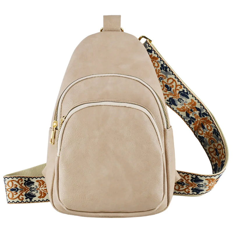 Beige leather Guitar Strap Sling Bag featuring a decorative patterned strap