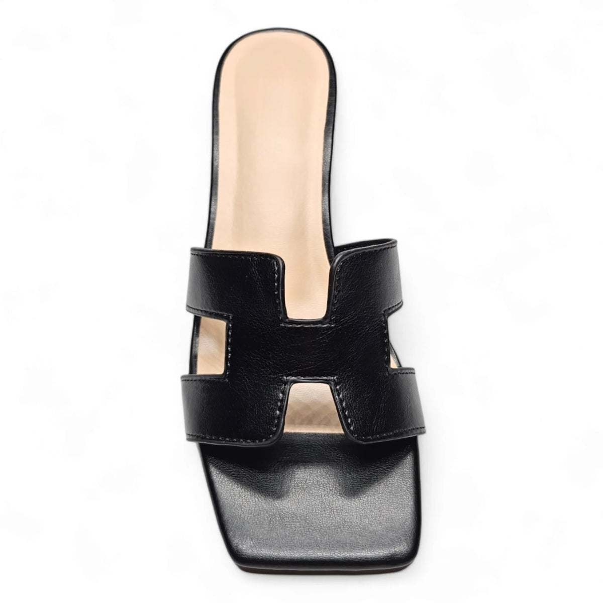 Black leather H Band Slide Sandal featuring a stylish cutout design on the upper