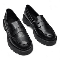 Pair of black leather Hutch Penny Loafers with chunky soles for stylish comfort