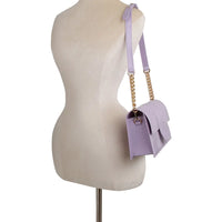 Mannequin torso showcasing Jelly Candy Crossbody Bag in light purple color