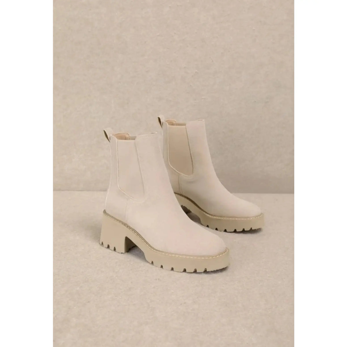 Cream-colored Josie Ankle Boots with chunky soles and thick heels for stylish comfort