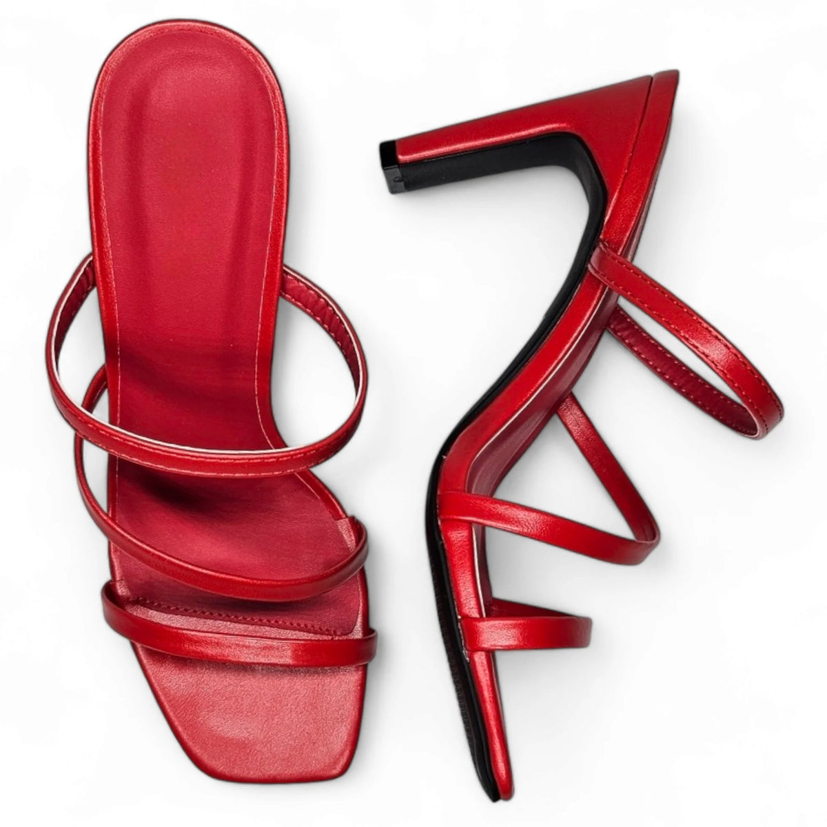 Pair of red Kaylee Strappy Sandals with multiple thin straps for stylish footwear