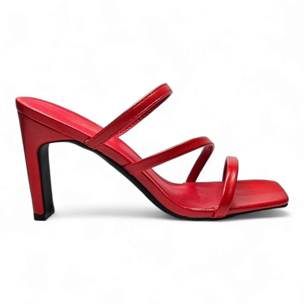 Red high-heeled Kaylee Strappy Sandal with thin straps perfect for elegant outfits