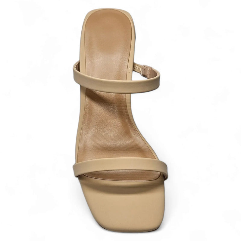 Beige high-heeled sandal with double straps perfect for stylish summer outfits