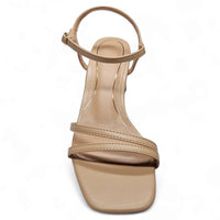 Beige leather sandal with thin straps and square toe, featuring a Kind Cylinder Heel for secure fit