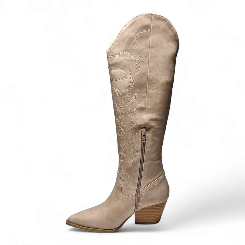 Beige leather knee high cowgirl boot with pointed toe and stacked heel