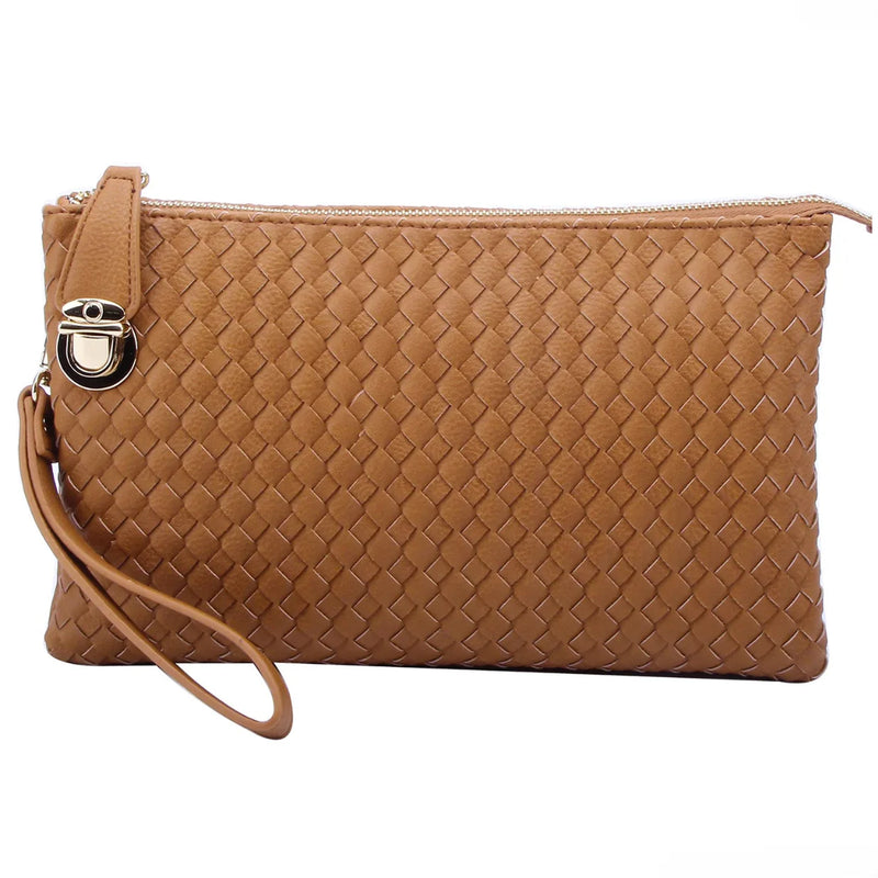 Tan leather large woven buckle bag with woven pattern and wrist strap