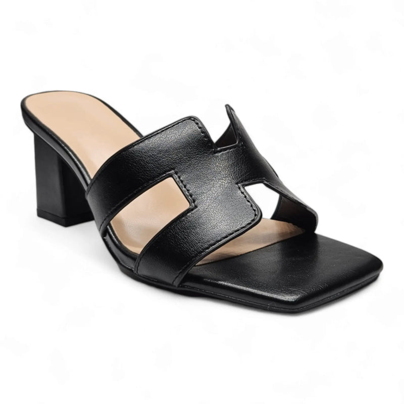 Black leather H Band Slide Sandal with block heel, square toe, and cutout design