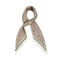 Leopard print silky bandana featuring a stylish white border for versatile fashion