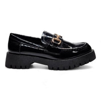 Black patent leather loafer with chunky sole and gold hardware for stylish footwear