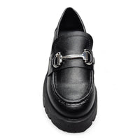 Black leather loafer with chunky sole and gold hardware horsebit detail across vamp