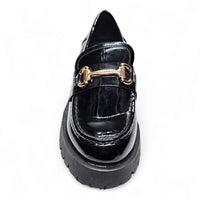 Black patent leather loafer with gold hardware and chunky platform sole