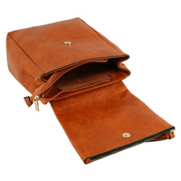 Tan leather Metro Flap Convertible Backpack featuring multiple compartments and zipper closure