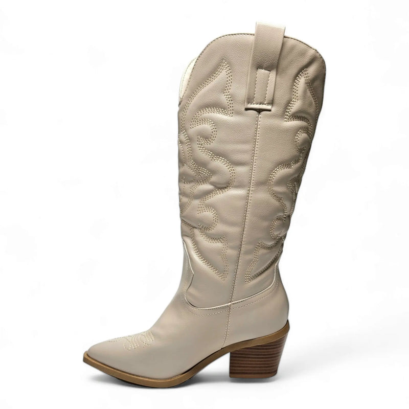 Cream-colored leather cowboy boot with western-inspired embroidered design and stacked heel