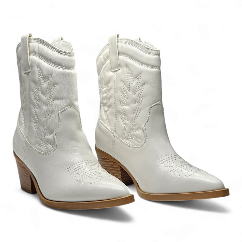 White leather Mini Mindful Bootie with pointed toes and stacked heels, ideal cowgirl ankle style