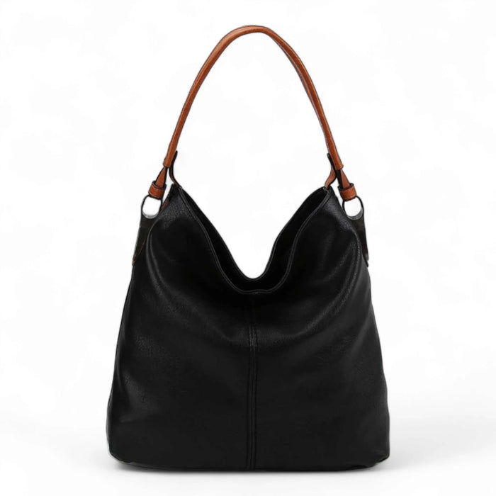 Black leather hobo bag with brown handles showcasing a stylish modern hobo design