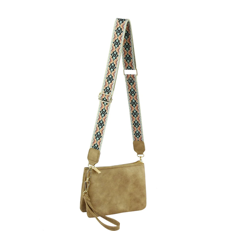 Beige suede multi compartment crossbody bag with colorful patterned guitar strap