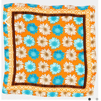 Colorful multi daisy flower print scarf on an orange background, perfect for stylish outfits