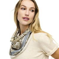 Patterned silk scarf with Greek key and paisley designs in gray and white tones