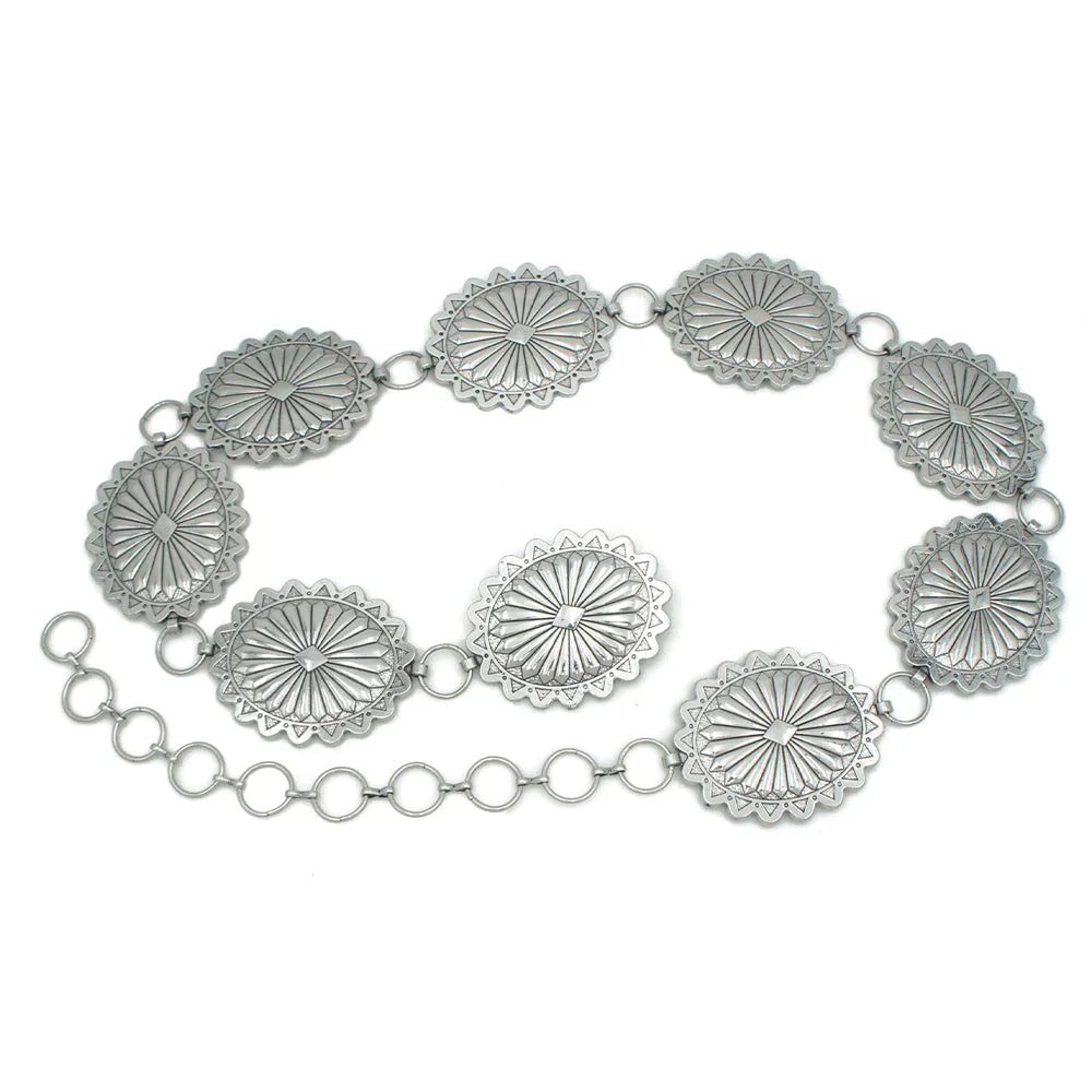 Silver concho link belt with floral medallions in an elegant oval concho design