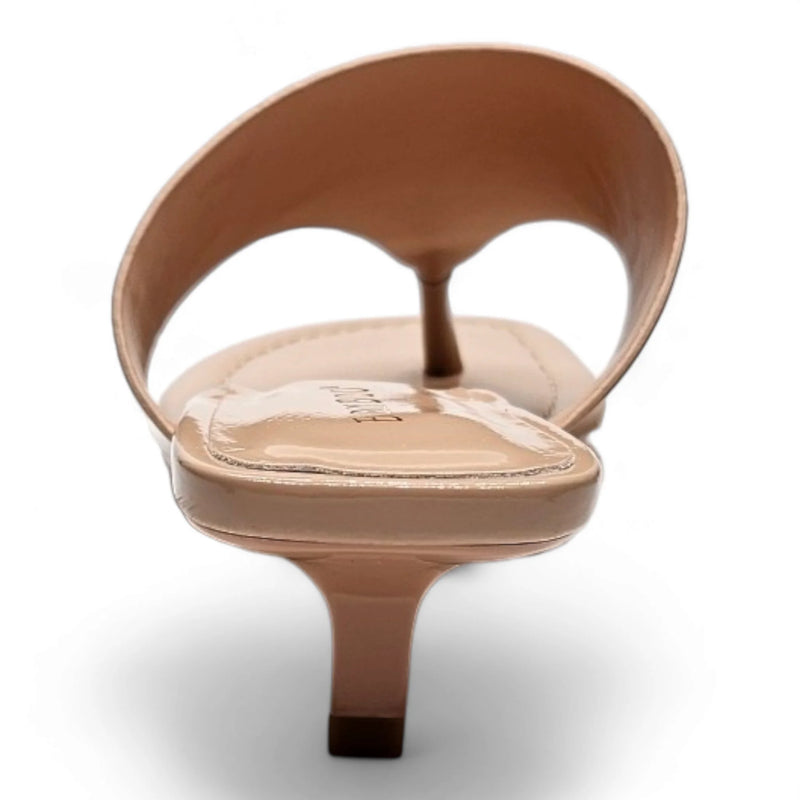 Beige patent kitten heel thong sandal with a low heel for stylish summer looks