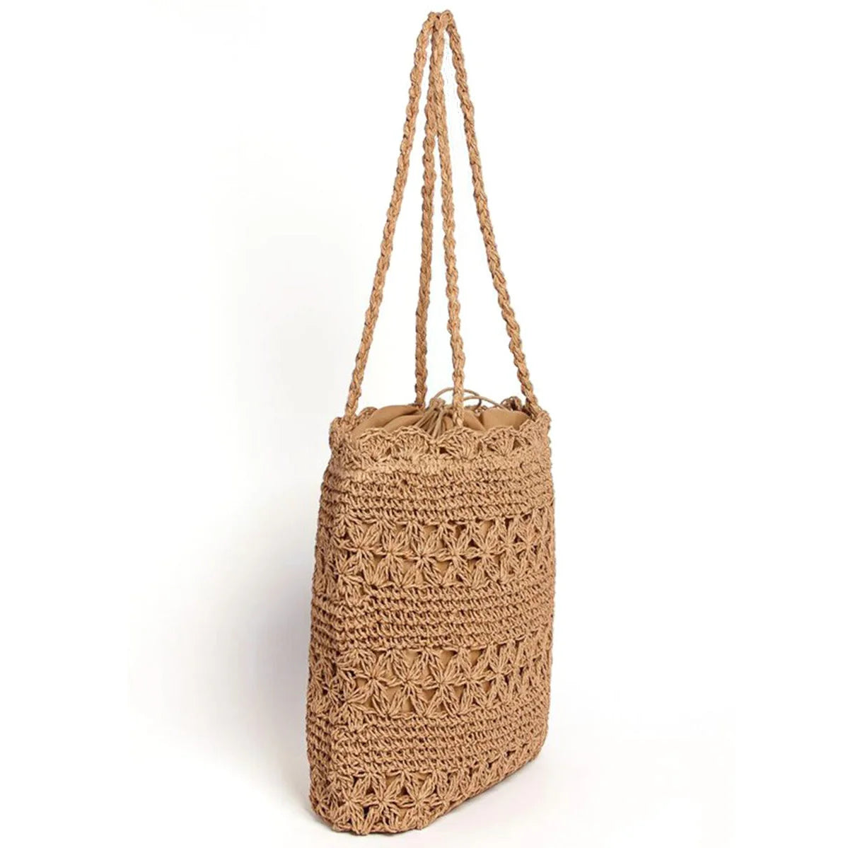 Stylish patterned straw tote bag with braided straps and a crocheted design