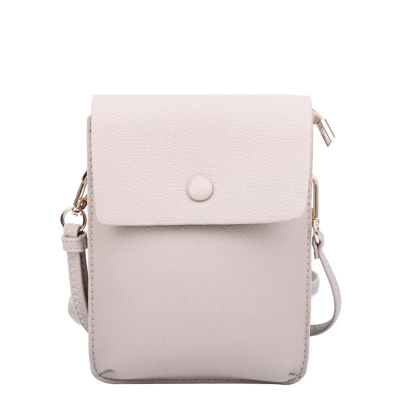 Pale pink pebble flap crossbody bag with adjustable strap and simple flap closure