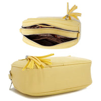 Yellow tassel crossbody bag with plain color zipper and zipper crossbody design