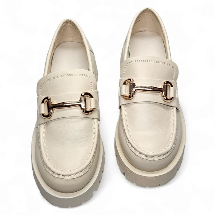 Cream loafers with gold hardware horsebit detail on the vamp, stylish and elegant