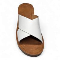 White leather cross-strap sandal with brown sole from Platform Criss Cross Sandals