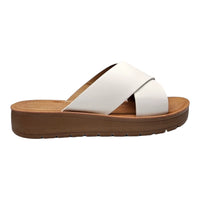 White leather cross-strap sandals with chunky brown sole for stylish summer comfort