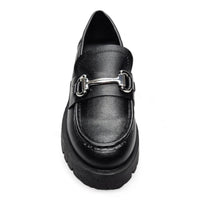 Black leather loafer with chunky sole and gold hardware horsebit detail across vamp