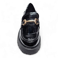 Black patent leather loafer with gold hardware and chunky platform sole