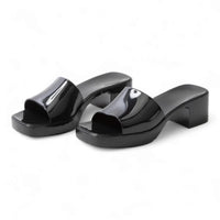 Black patent leather platform sandals with chunky heels from Platform Jelly Slides