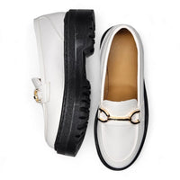 Contrasting white and black Platform Loafers with stylish gold hardware details