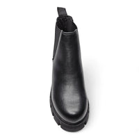 Black leather Lug Sole Chelsea Bootie with chunky rubber sole for durability and style