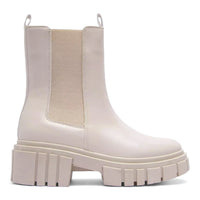 Chunky off-white Puro Combat Boots featuring elastic side panels for stylish comfort