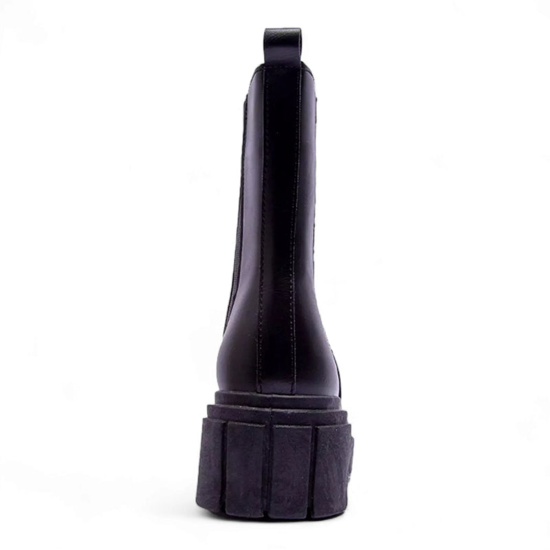 Black rubber flashlight with wide base complements Puro Combat Boots for outdoor adventures