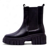 Black leather Chelsea Puro Combat Boots featuring a chunky platform sole