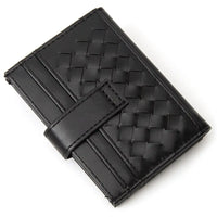 Black woven leather card holder with quilted weave pattern for stylish organization