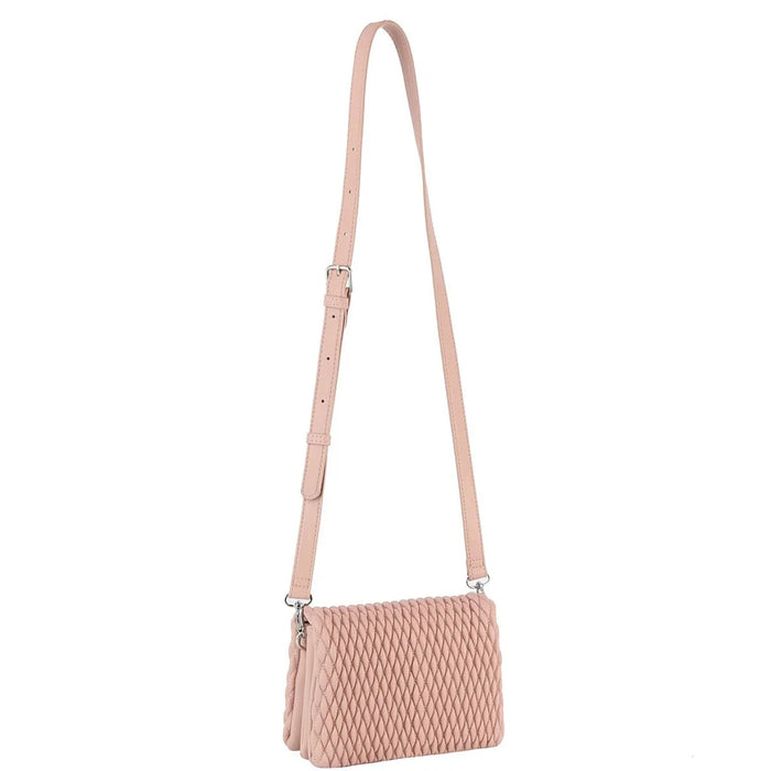 Pink quilted leather crossbody bag with adjustable strap for stylish women